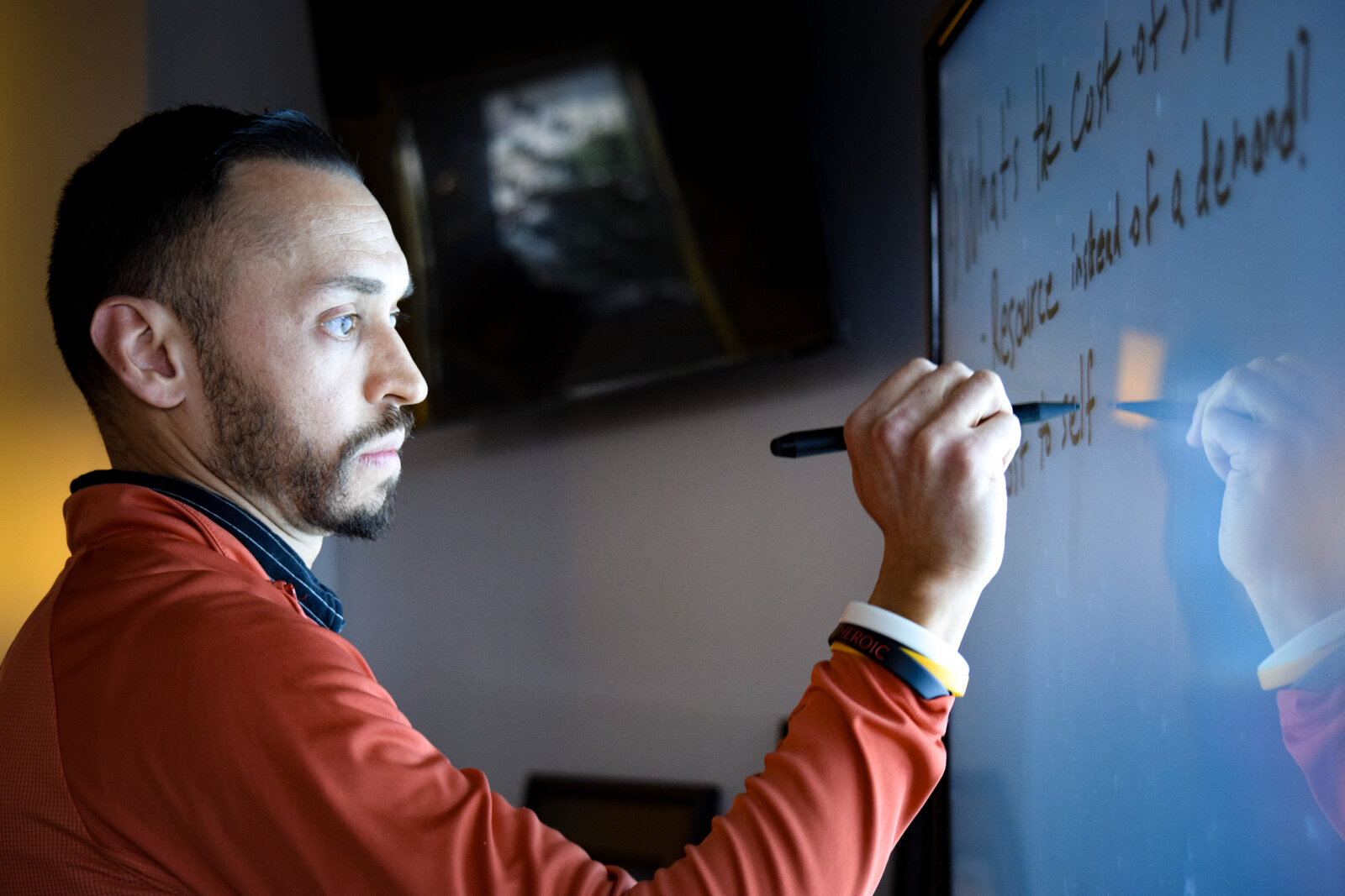 Tony Bushong coaching at a whiteboard